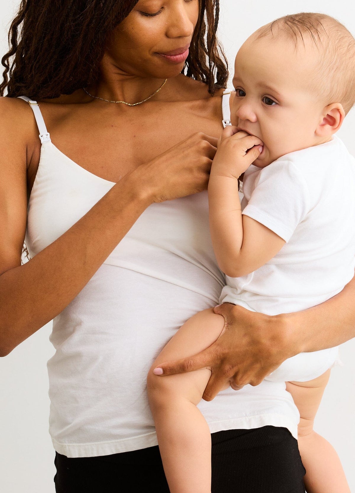 The 24/7 Nursing Tank - White maternity nursing tank with adjustable straps, slimming fit for pregnancy and postpartum.