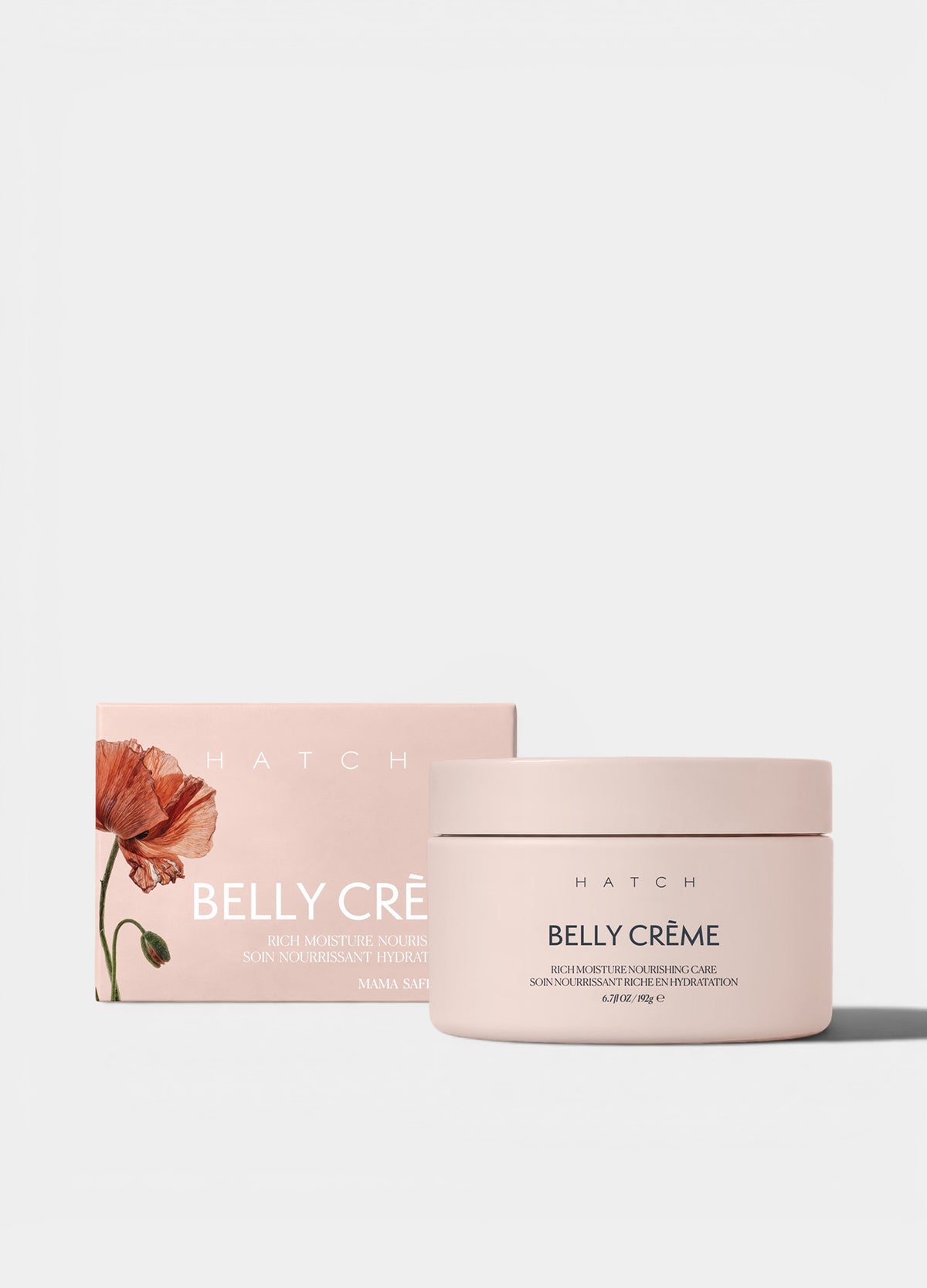 Soft pink jar of Belly Crème with matching box featuring a delicate red poppy illustration.
