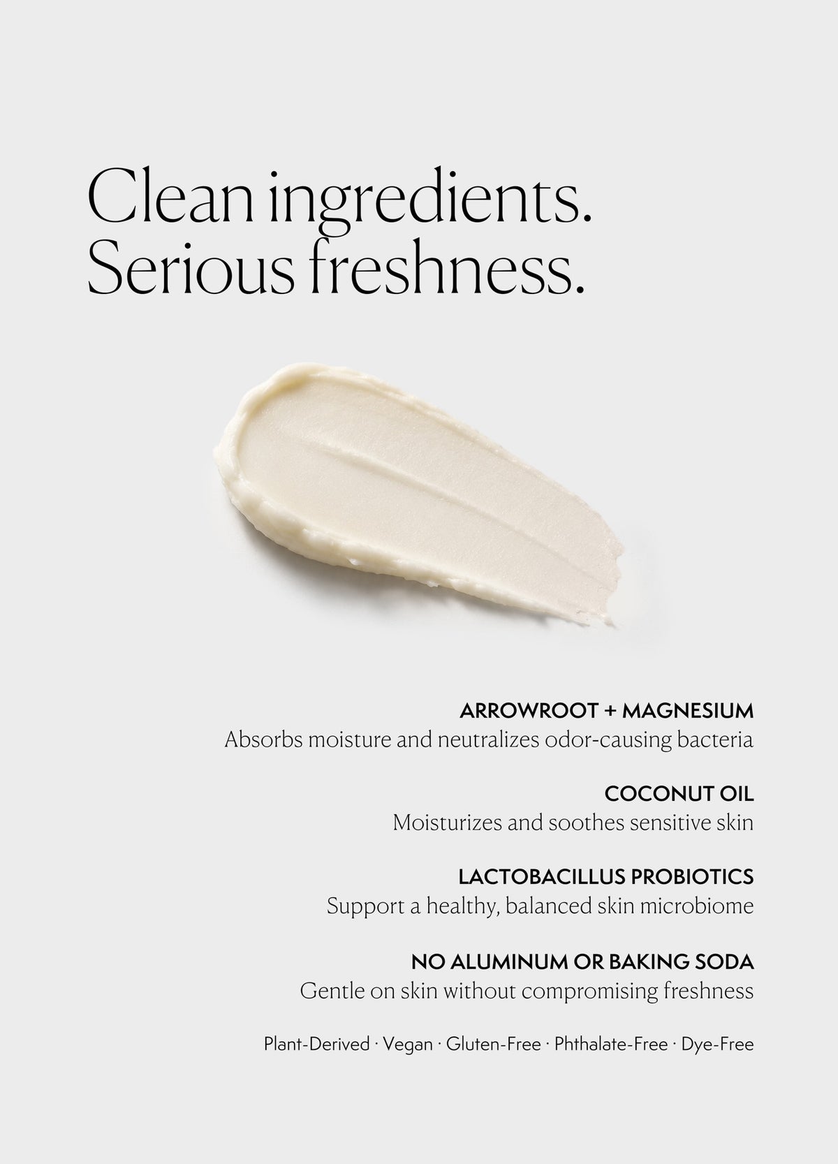 Creamy white deodorant balm smear on light background, smooth texture suggesting gentle, natural ingredients.