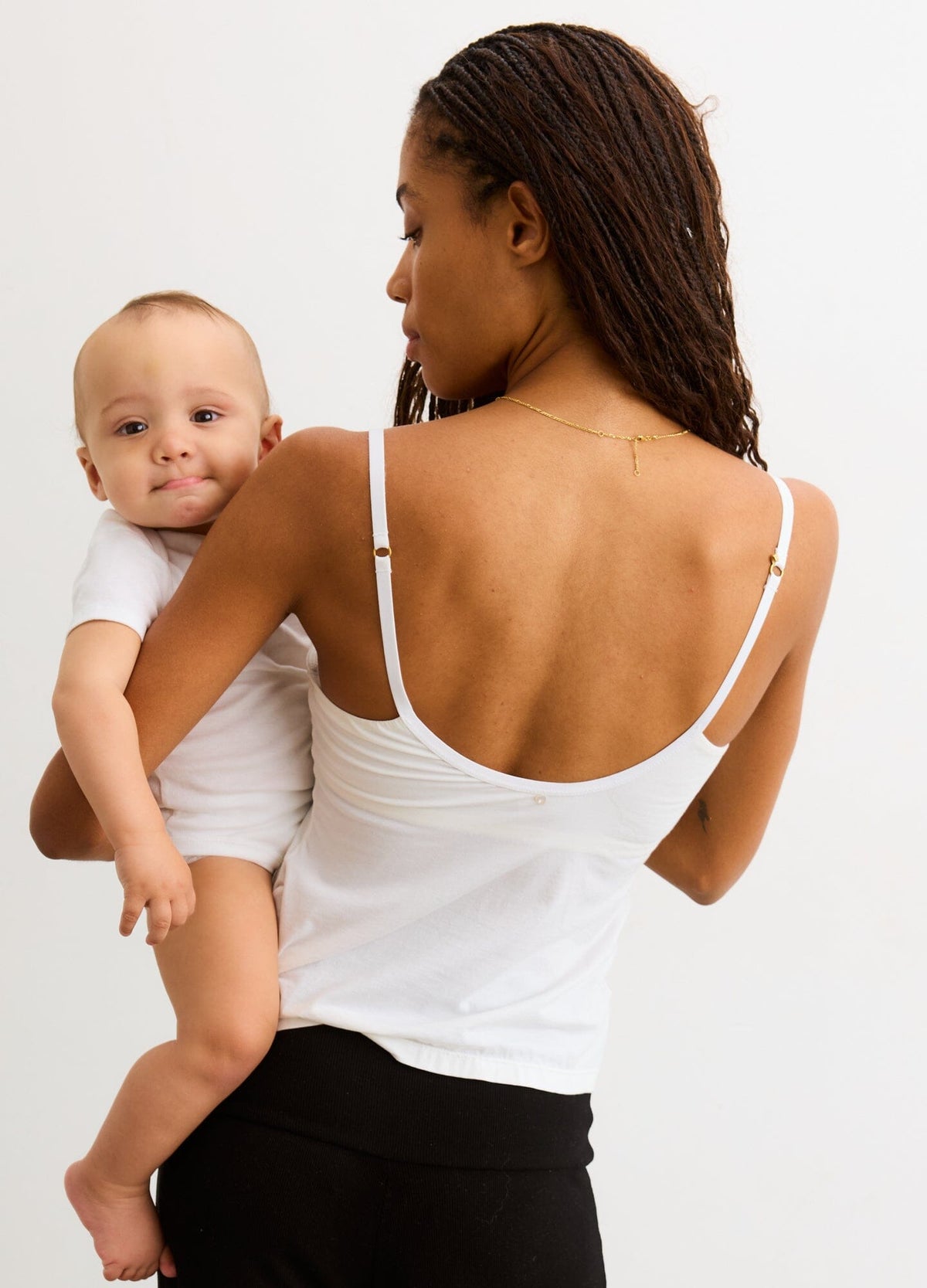 The 24/7 Nursing Tank - White maternity nursing tank with adjustable straps, slimming fit for pregnancy and postpartum.