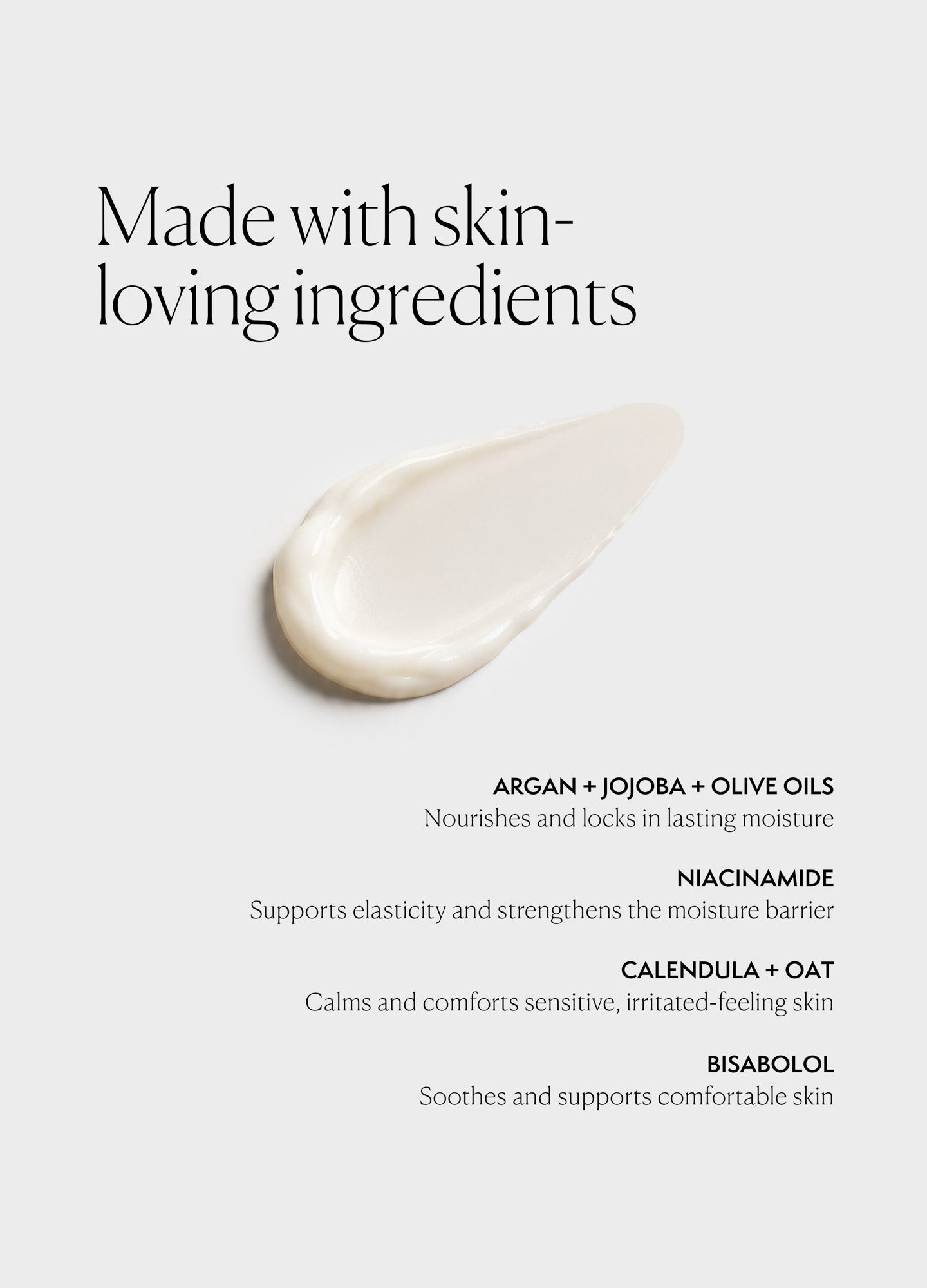 White creamy belly creme smear with smooth texture on a light background, highlighting hydrating and soothing properties for