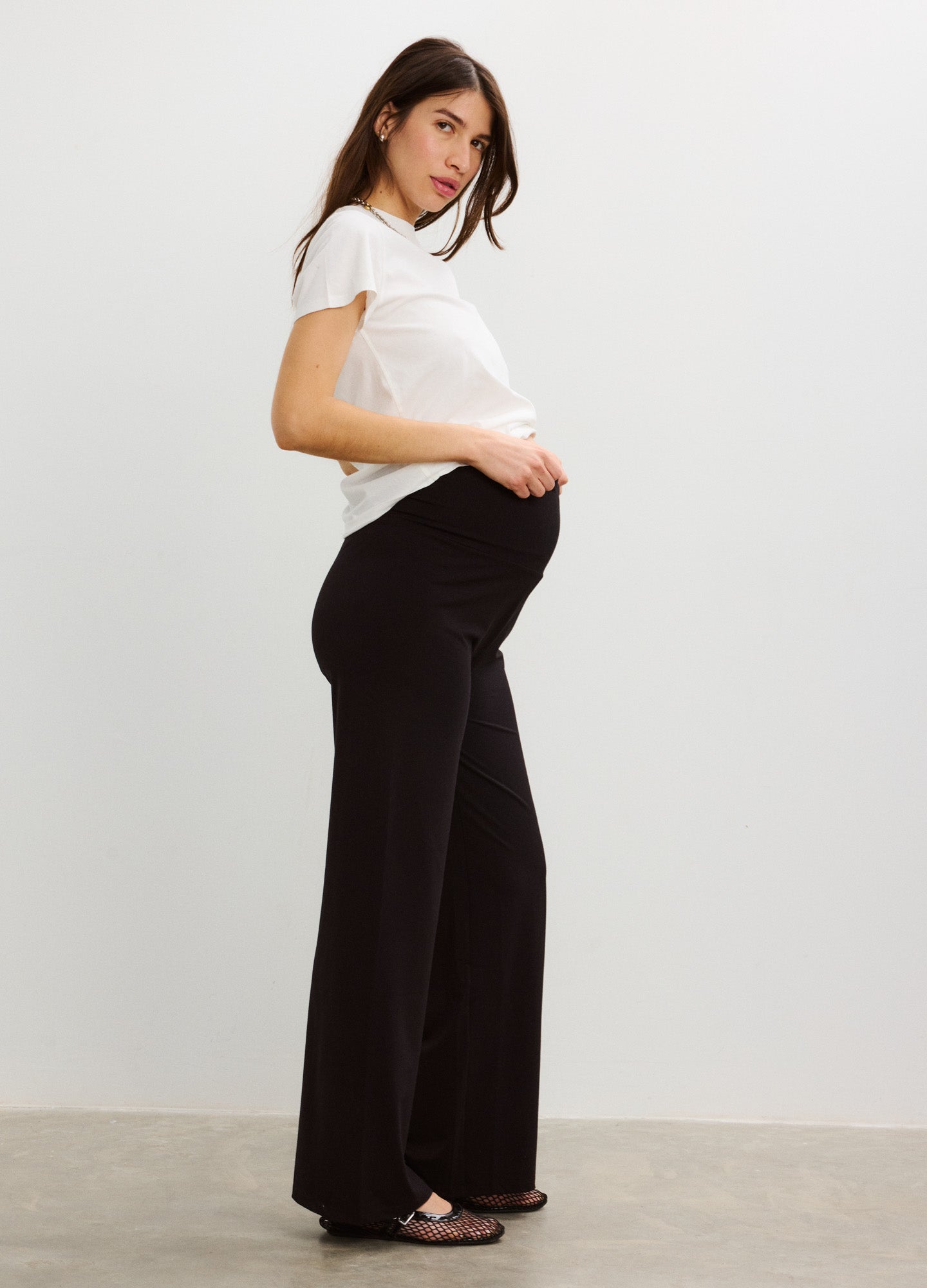 Black maternity lounge pants with wide legs and a high, stretchy waistband designed for pregnancy comfort.