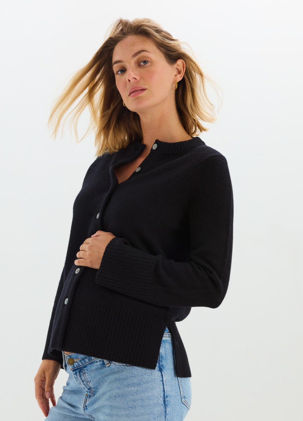 Black maternity cardigan with round neckline, ribbed cuffs, and front buttons.