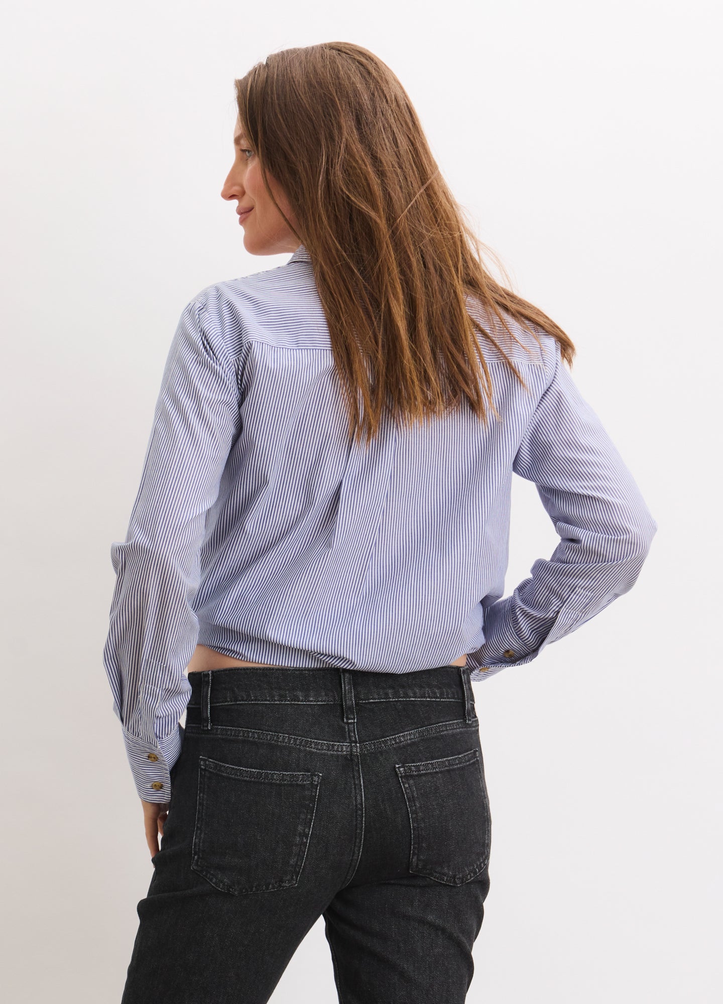 Light blue striped long-sleeve maternity buttondown shirt with classic collar and tailored fit.