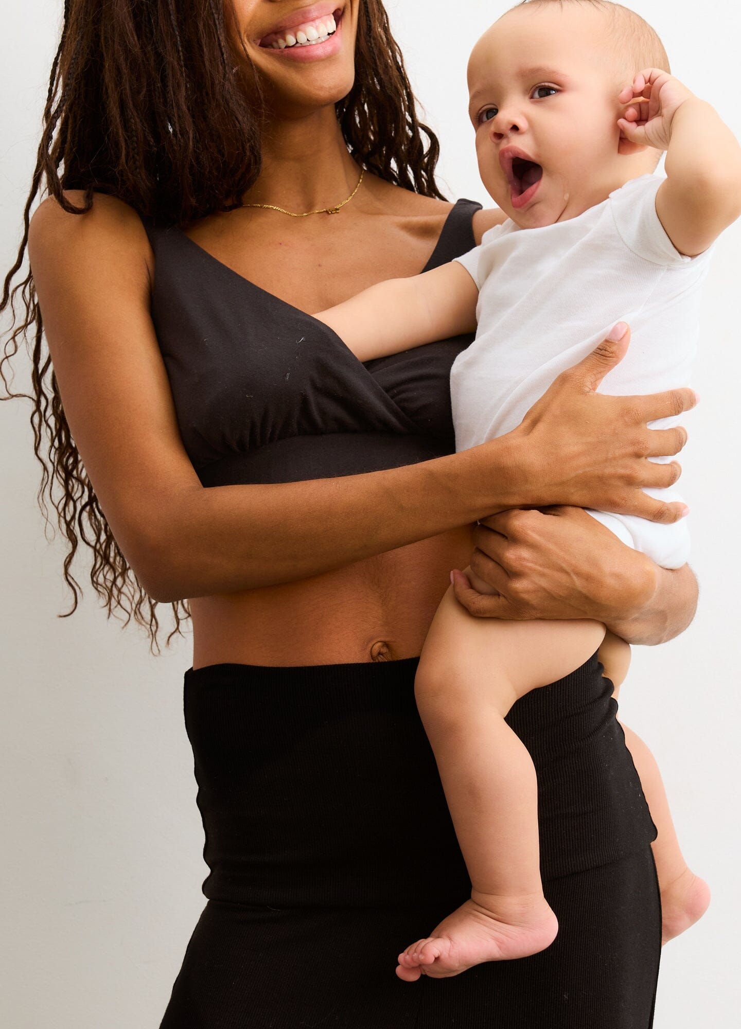 The Dream Feed Nursing And Sleep Bra - Black nursing bra with supportive wide straps and easy access for maternity, pregnancy, and postpartum wear.