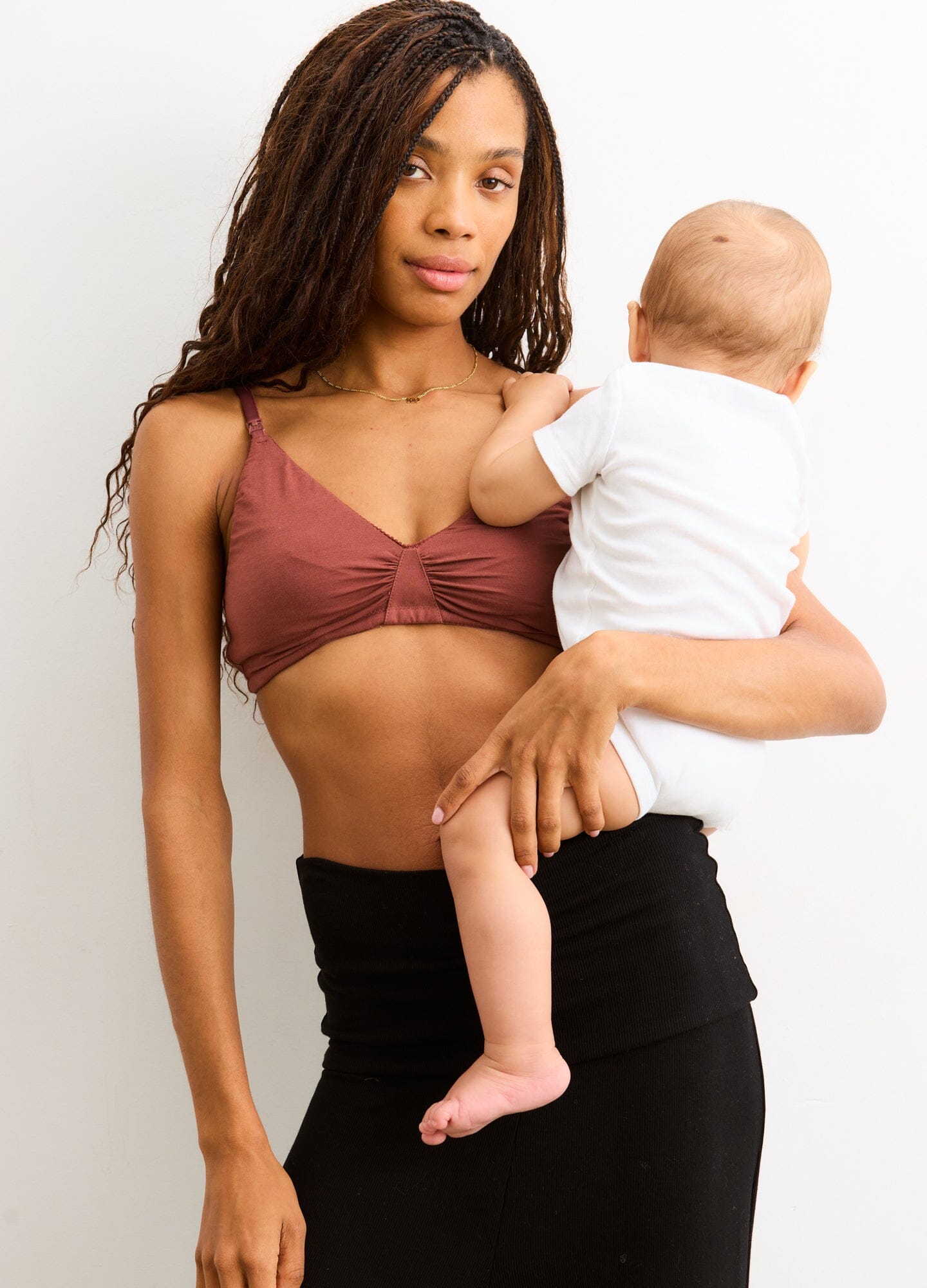The Everyday Nursing Bra - Rust-colored maternity nursing bra with soft fabric, adjustable straps, and easy nursing access, designed for pregnancy and.