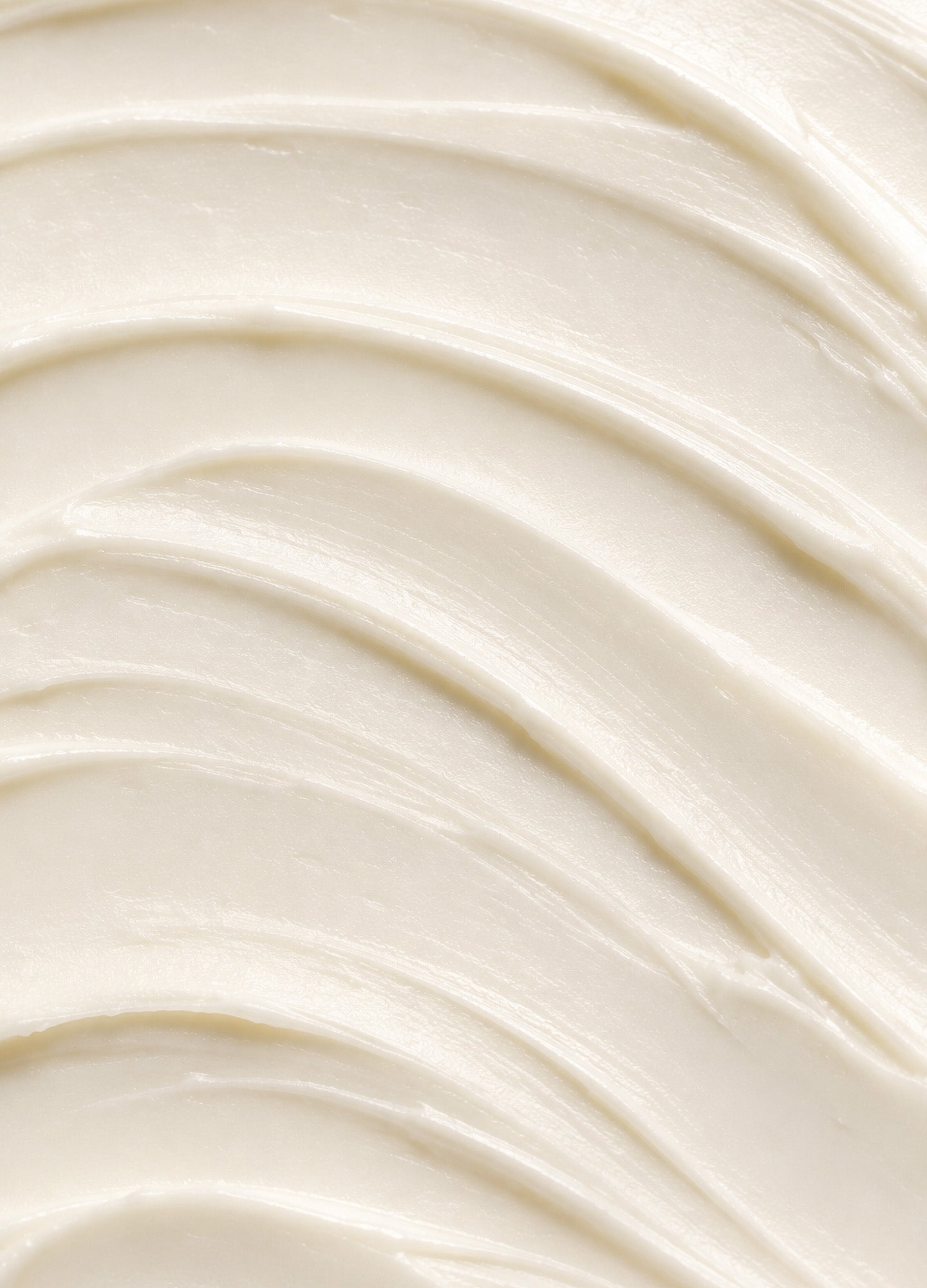 Smooth white creamy texture with soft wave patterns, suggesting a fresh, soothing maternity deodorant cream.