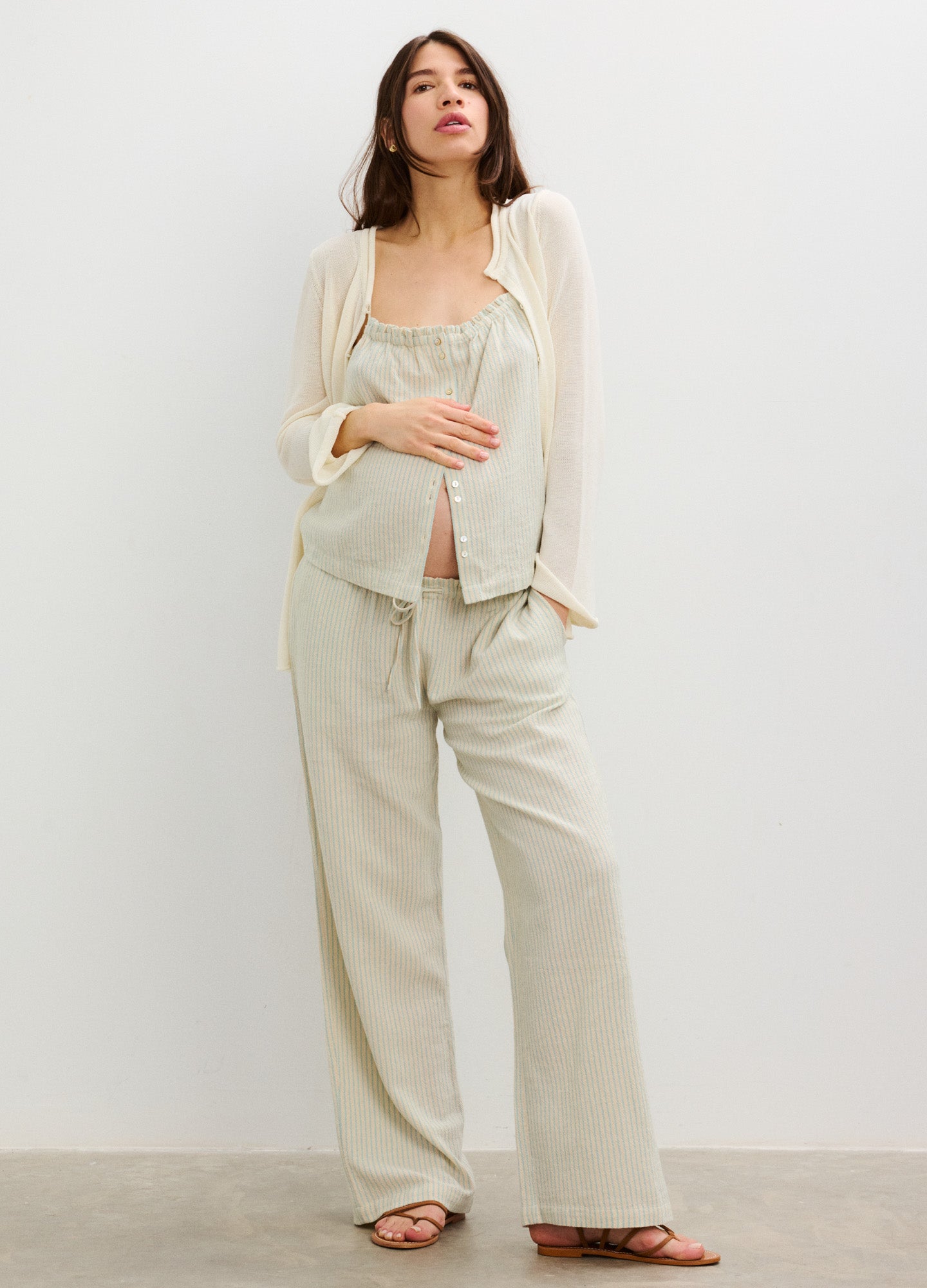 Light beige maternity nursing top with matching wide-leg pants and a button-up cardigan in soft, breathable fabric.