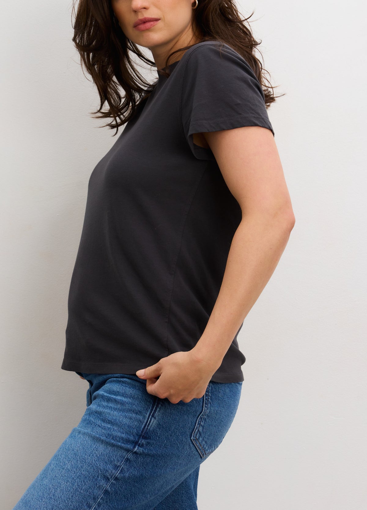 Black washed cotton short sleeve crew neck maternity t-shirt with relaxed fit.