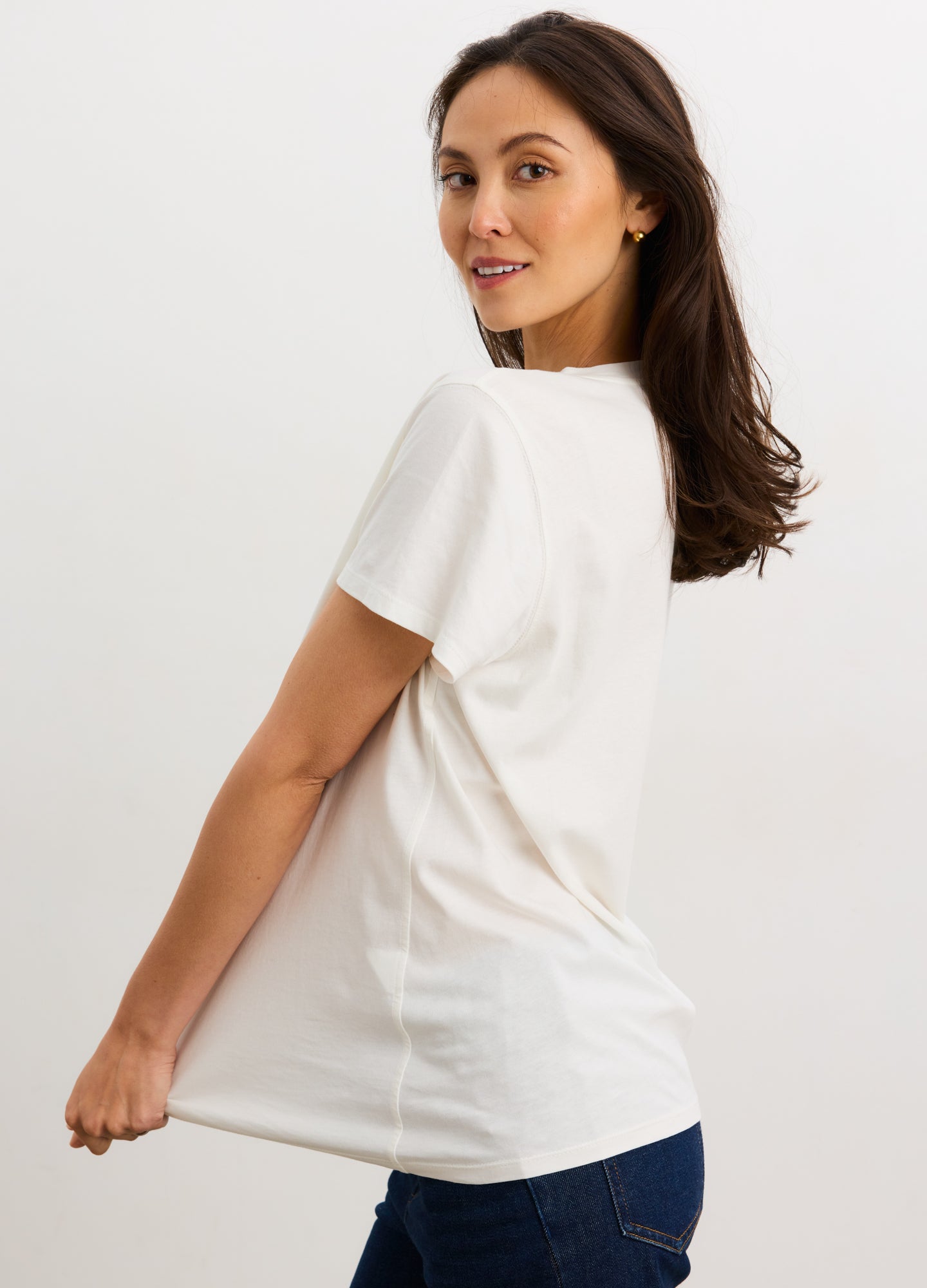 White short-sleeve maternity crew neck t-shirt with a relaxed fit and soft cotton fabric.