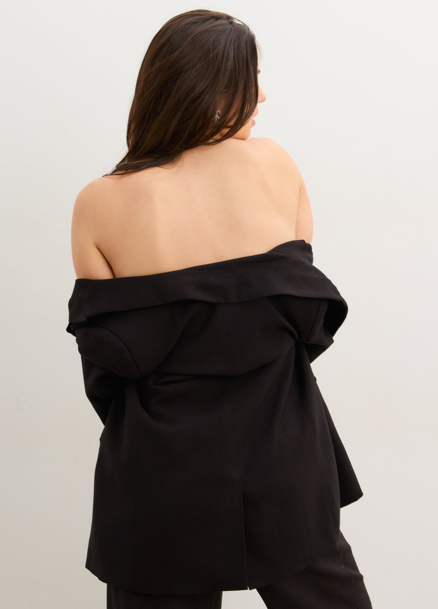 The Soft Tailored Twill Blazer - Black tailored twill blazer with double-button closure, designed for maternity, nursing, and postpartum wear.