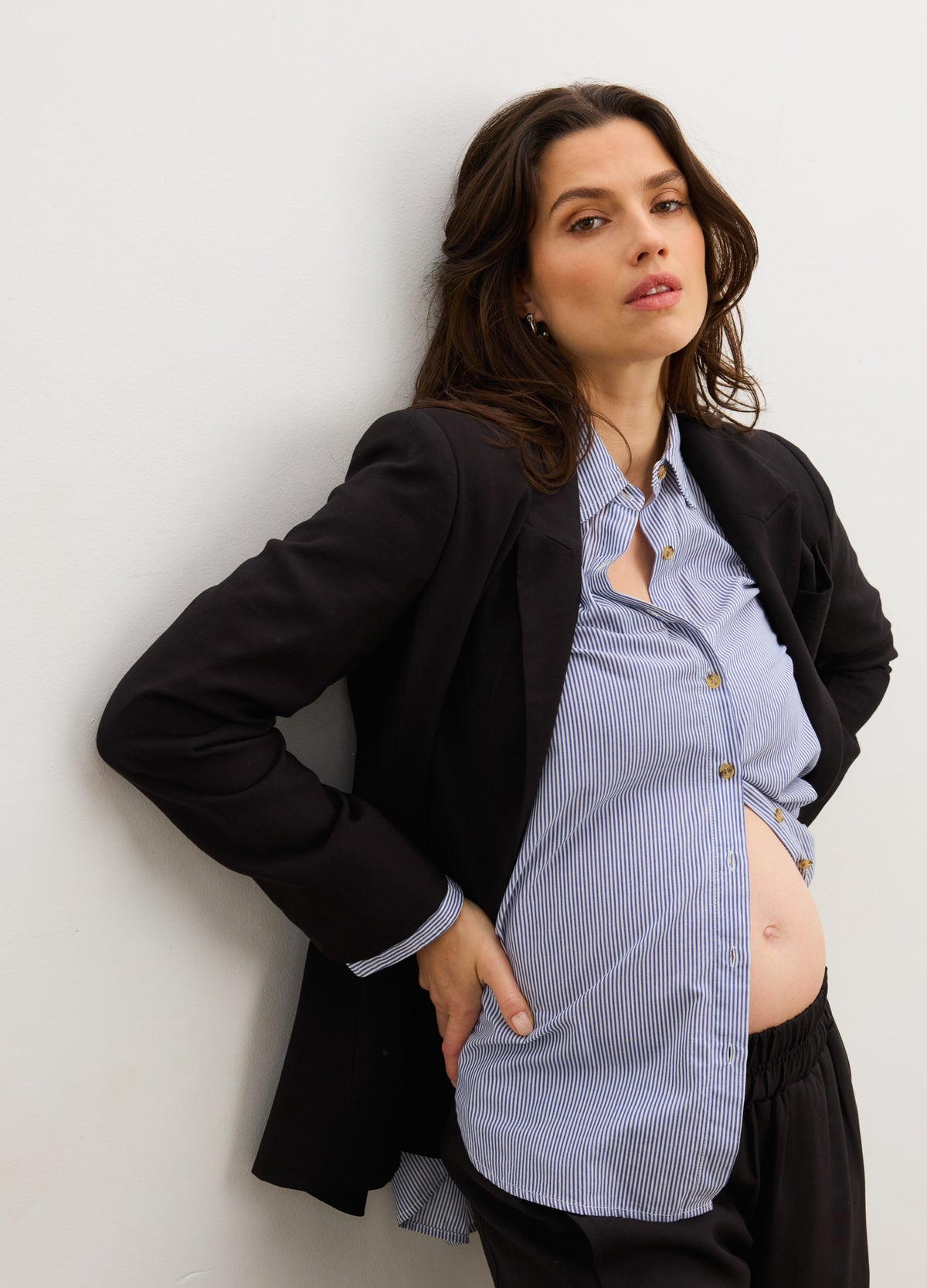 The Soft Tailored Twill Blazer - Black tailored twill blazer with double-button closure, designed for maternity, nursing, and postpartum wear.