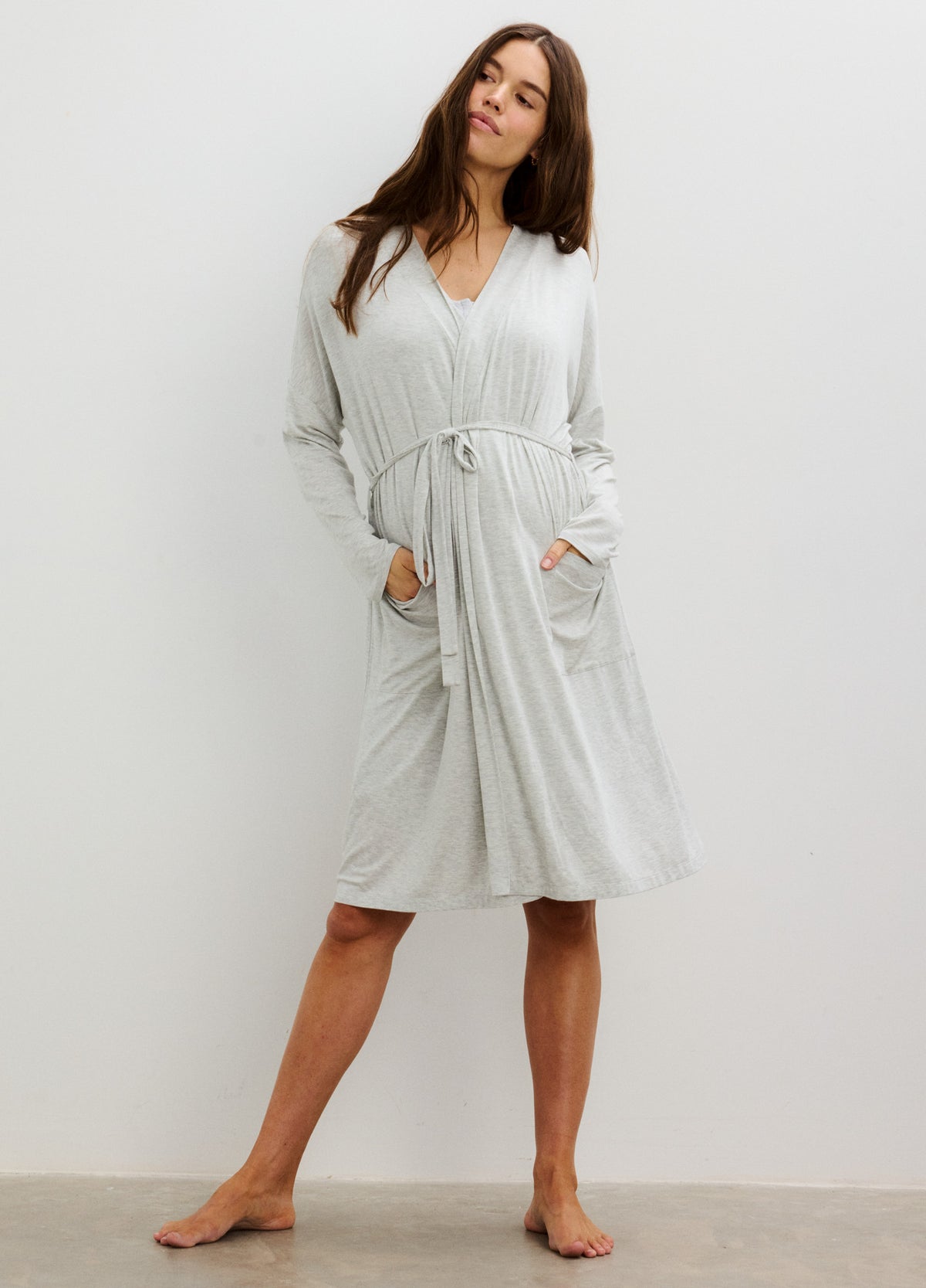 Light gray knee-length maternity robe with long sleeves, wrap front, and waist tie belt.