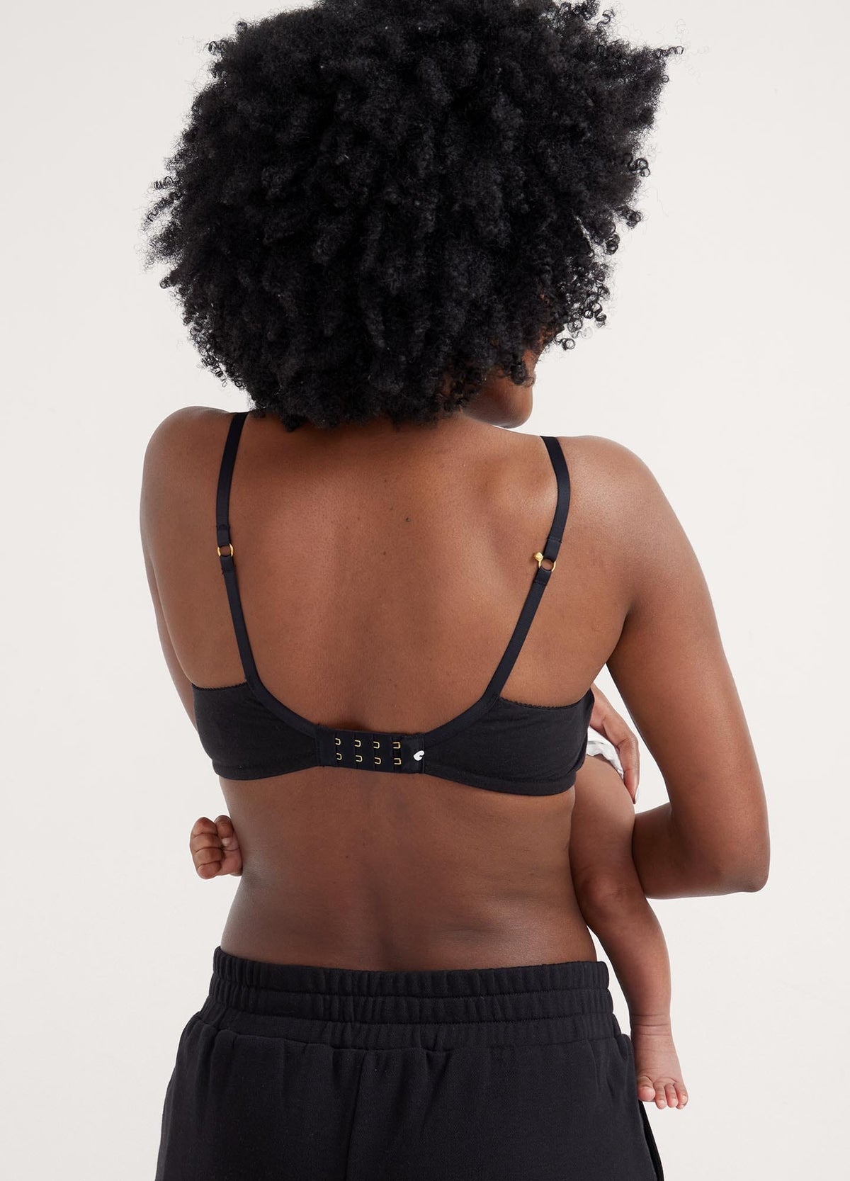 The Everyday Nursing Bra - Black maternity nursing bra with adjustable straps designed for pregnancy and postpartum comfort.
