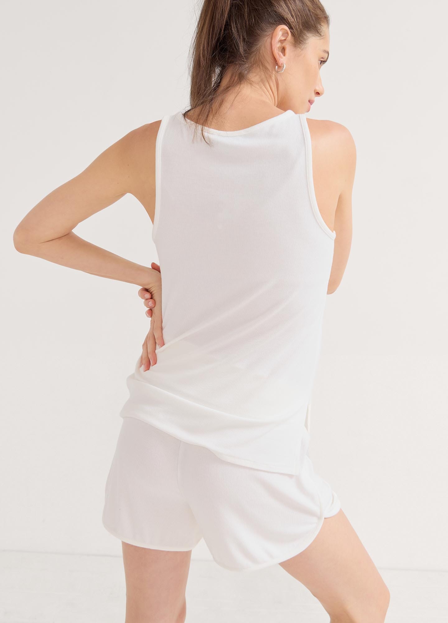 The Softest Rib Nursing Tank - Light blue ribbed nursing tank with button front, styled for maternity and postpartum comfort.