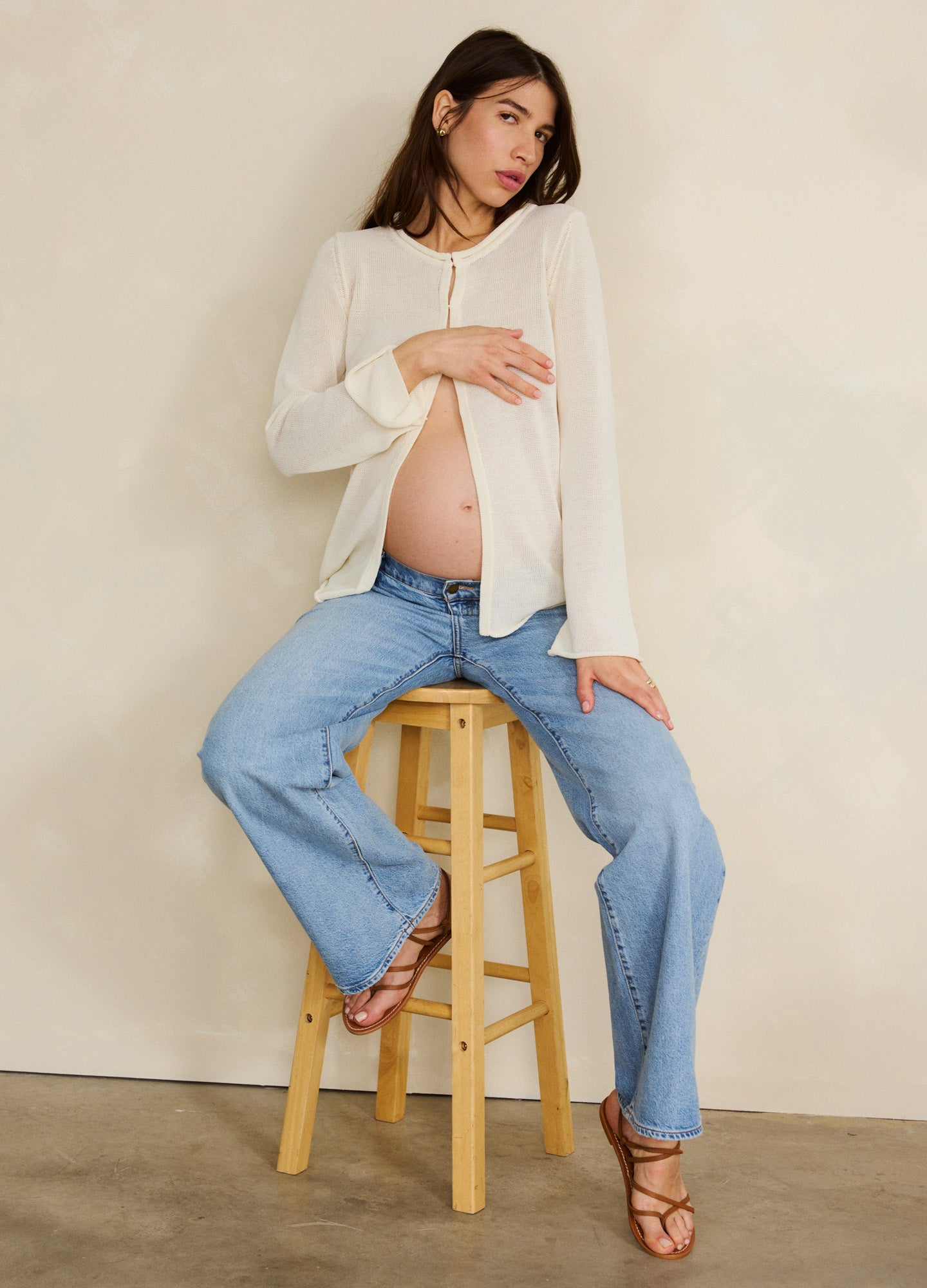Light blue relaxed wide-leg maternity jeans with a soft stretch waistband and casual fit.