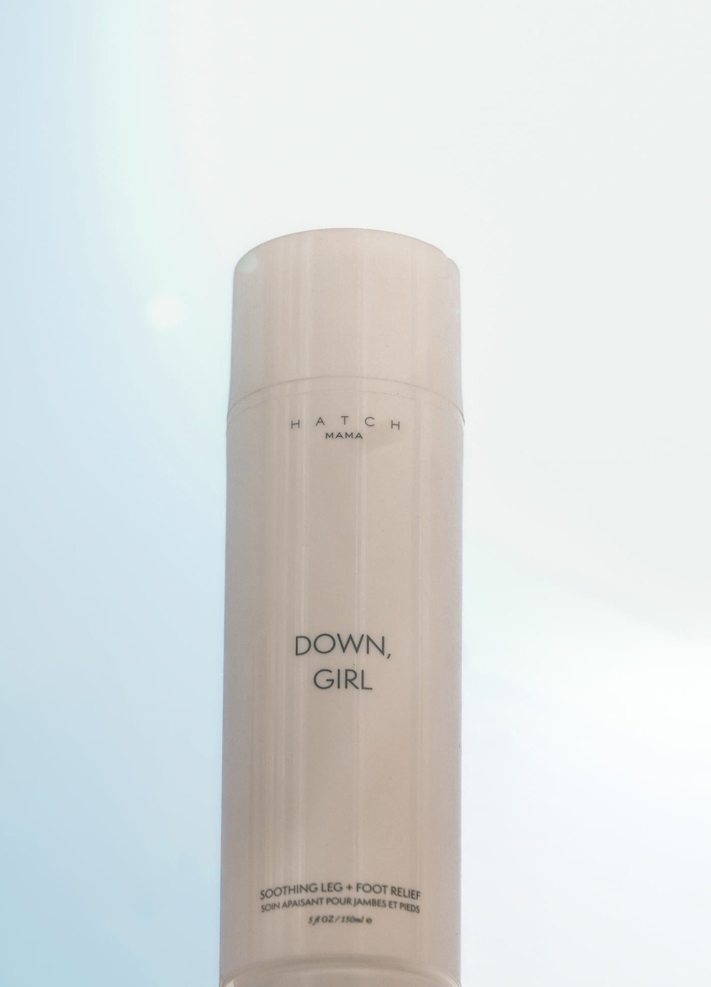 Down, Girl - White lotion bottle labeled Down, Girl with smooth cream dollop, designed for maternity, pregnancy, nursing, postpartum care.
