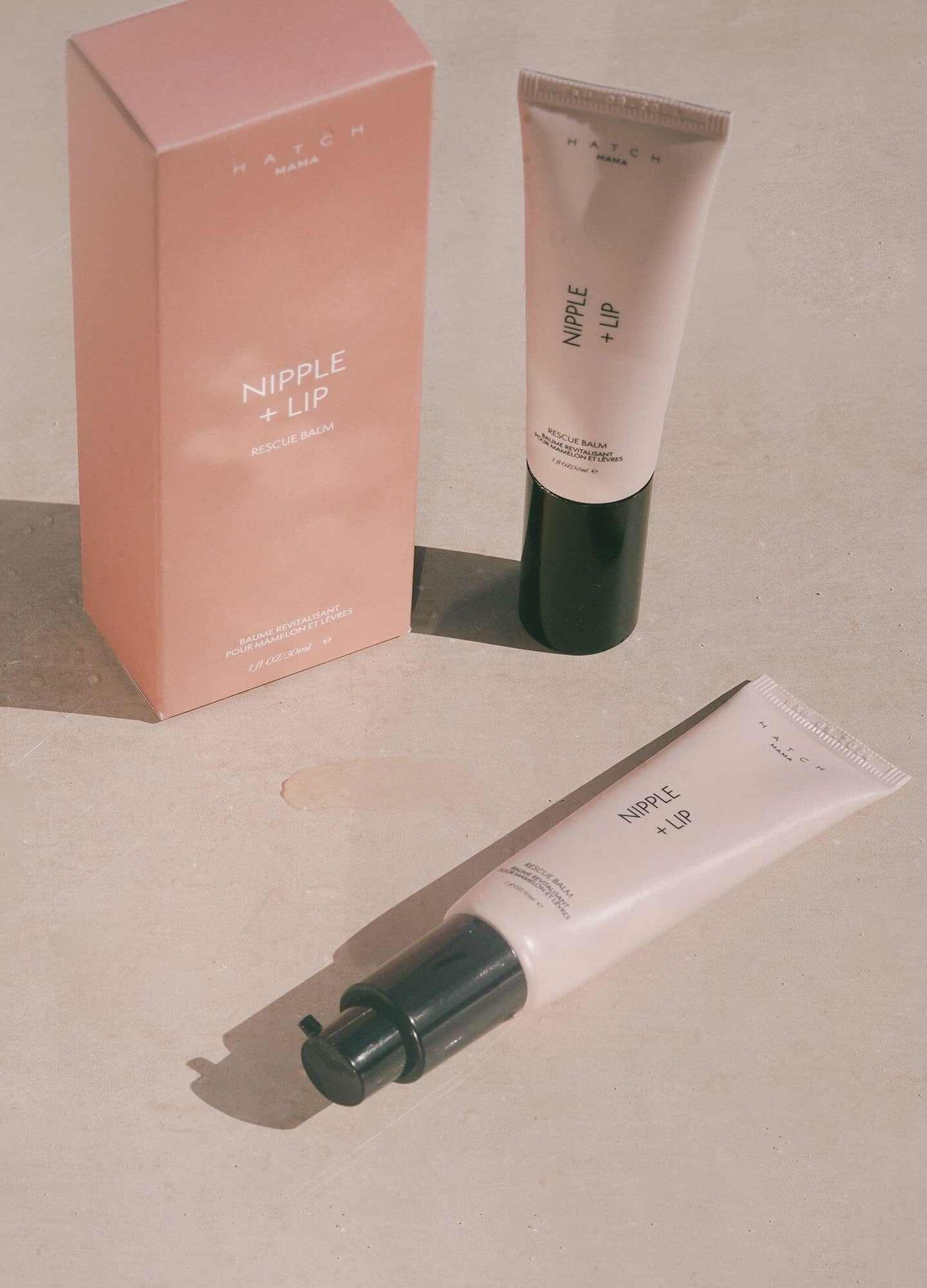 Nipple + Lip cream tube and matching pink box for pregnant and maternity skincare, 1 oz/30mL.