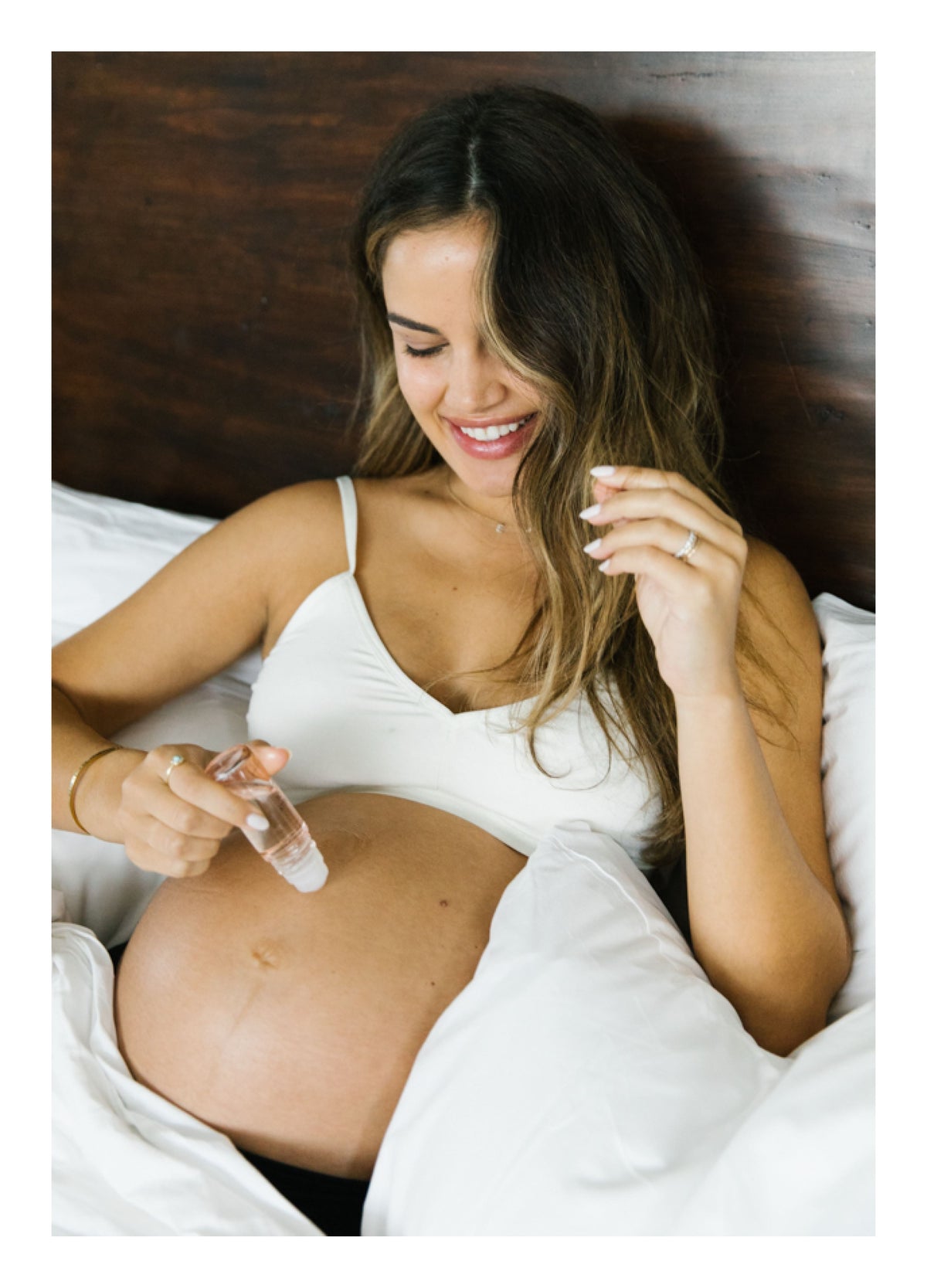 Belly Oil Mini Me - Hatch Mama Belly Oil Mini Me 1 oz roller bottle for maternity, pregnancy, nursing, and postpartum care.